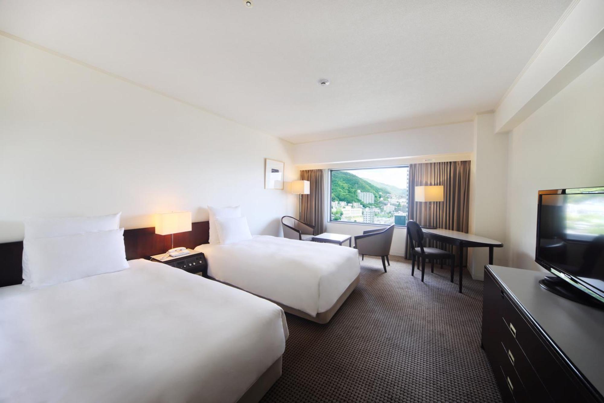 Hotel Ana Crowne Plaza Kobe By Ihg Exterior foto A room at the hotel